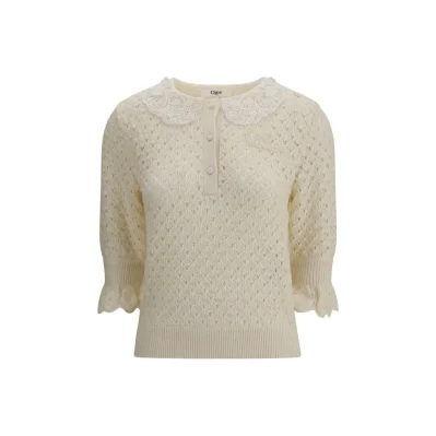 Sweater with lace collar