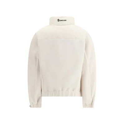 Jacket with sleeves in contrast